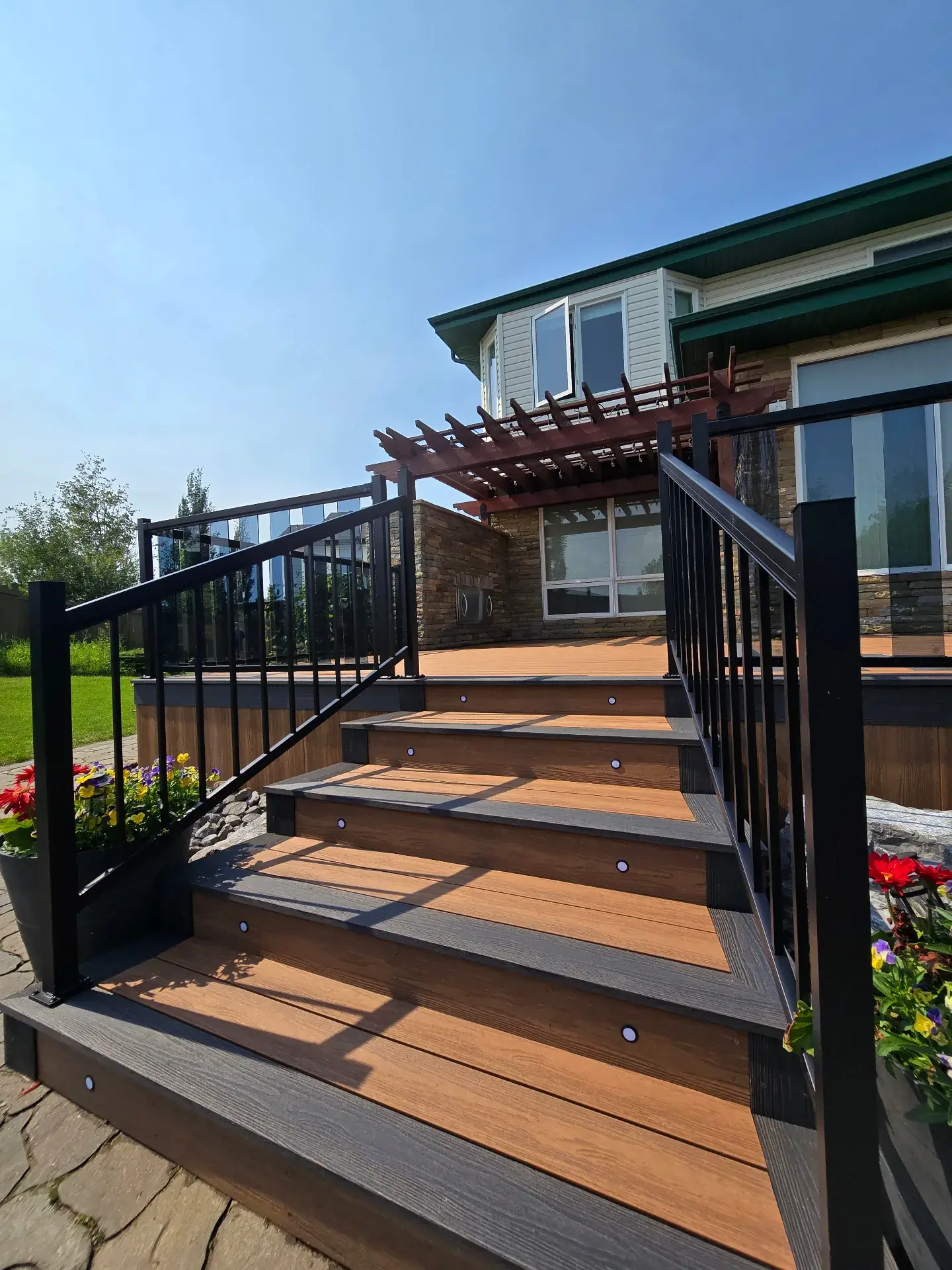 Two-tone Eva-Last deck with Celtic knot inlay and glass railing — photo 4