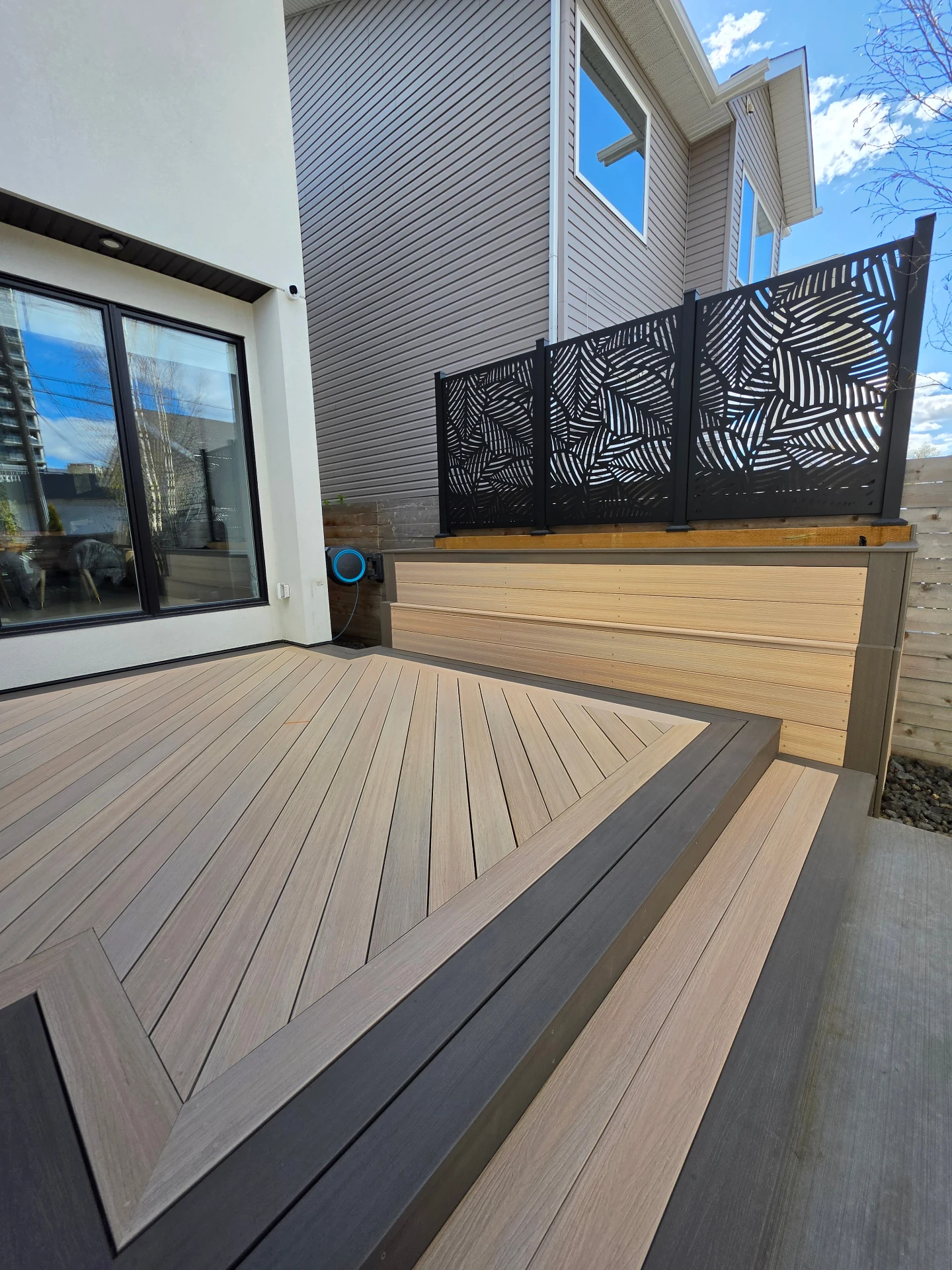 Composite deck with laser-cut privacy screens