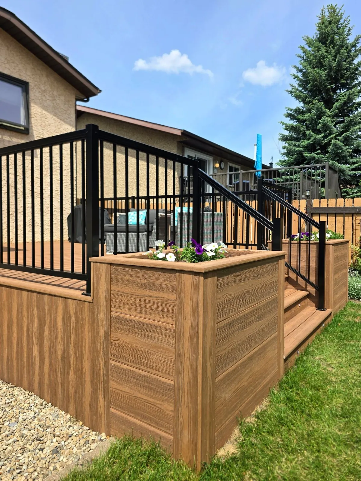 Eva-Last composite deck with planters & stair lighting
