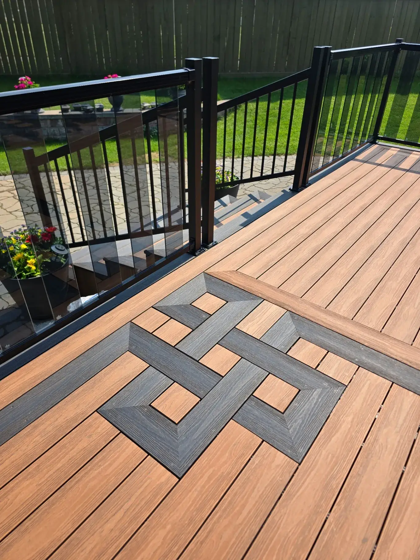 Two-tone Eva-Last deck with Celtic knot inlay and glass railing — photo 5