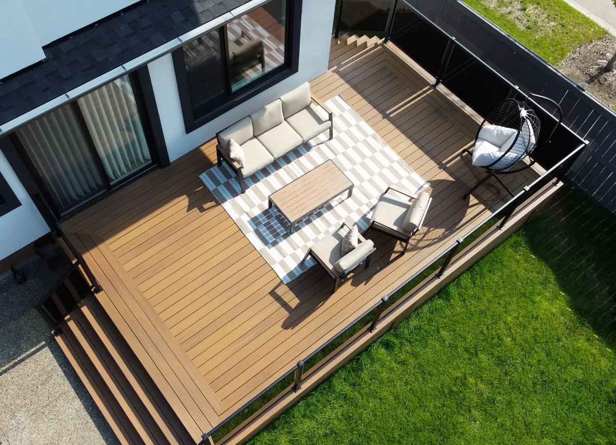 Fiberon deck with triple picture framing and glass railing