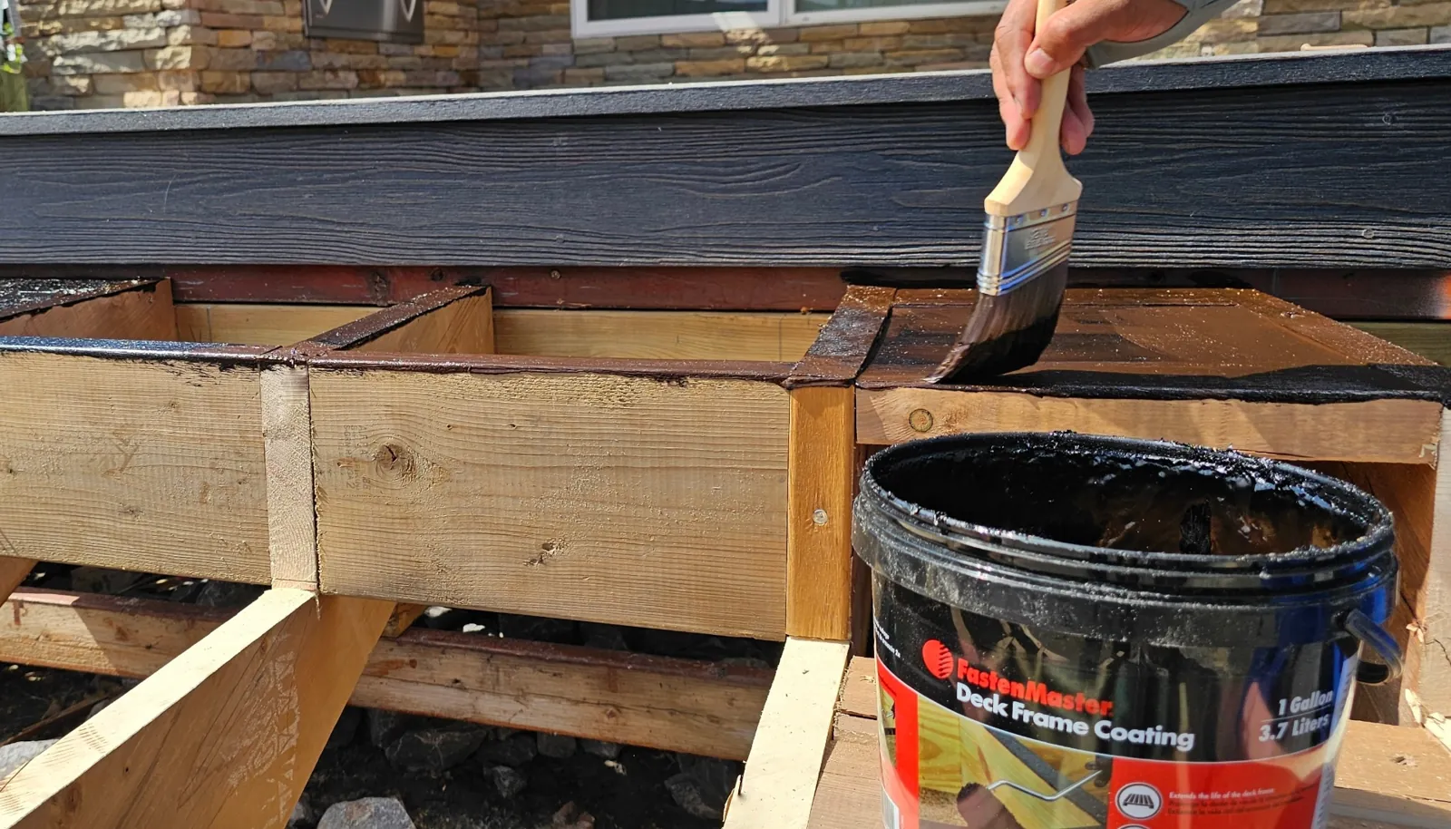 Applying protective coating to deck framing
