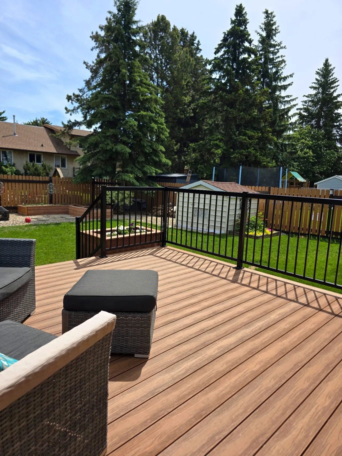 Eva-Last composite deck with planters & stair lighting — photo 3