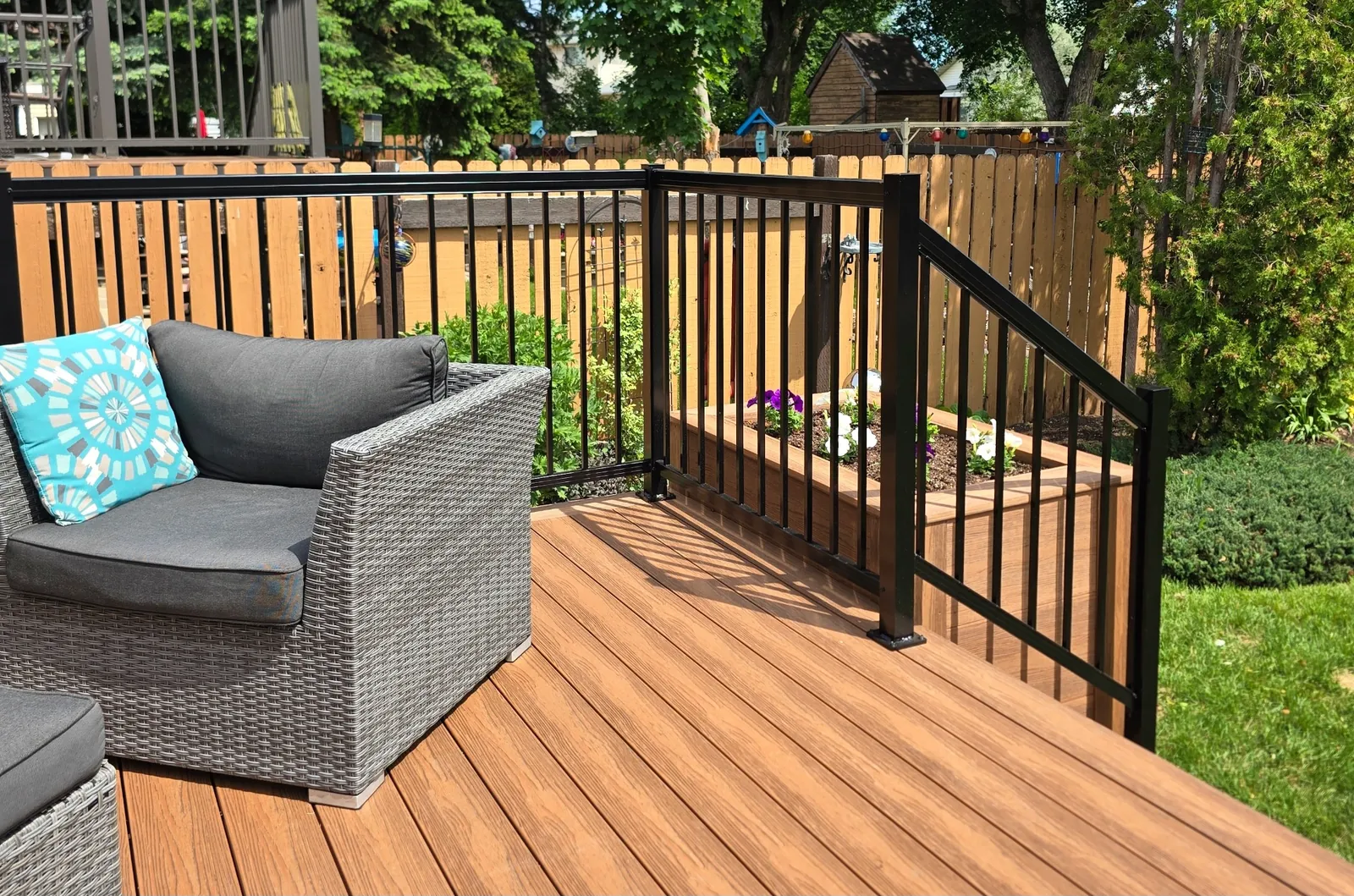 Eva-Last composite deck with planters & stair lighting — photo 5
